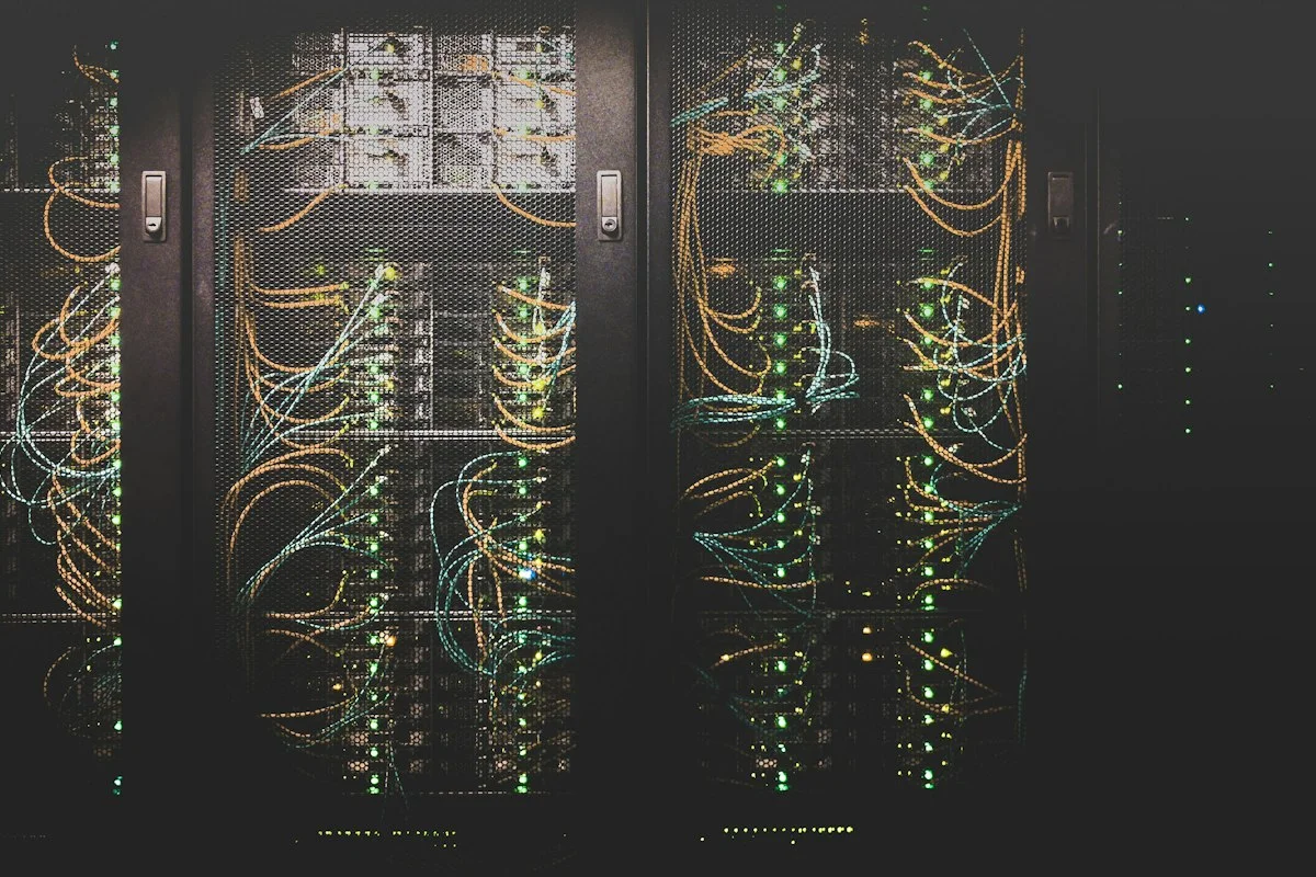 Close-up of enterprise server motherboard showing high-speed NVMe SSD heatsinks and high-bandwidth network controllers